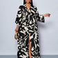 Floral printed v-neck long ruffle sleeve split thigh maxi in black