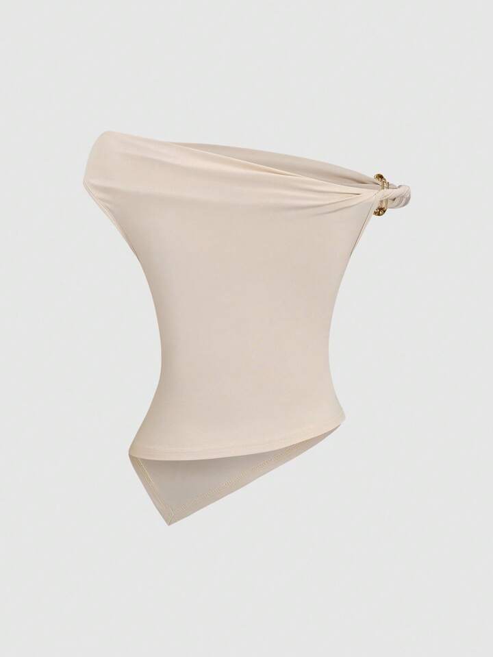 Gold decor twist asymmetric top in nude