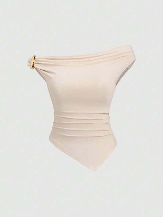 Gold decor twist asymmetric top in nude