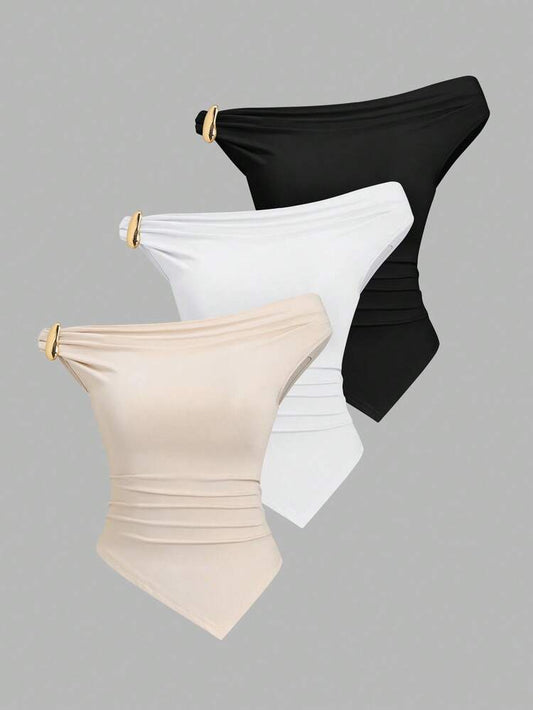 Gold decor twist asymmetric top in black