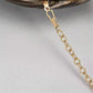 Gold pu ripple design box-shaped clutch in brown