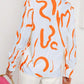 Graphic print button front shirt in orange