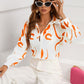 Graphic print button front shirt in orange