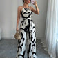 Halterneck ruched jumpsuit in multi