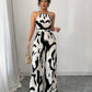 Halterneck ruched jumpsuit in multi