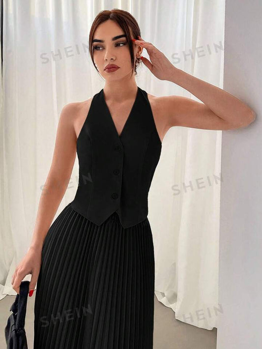 Halterneck vest and pleated skirt set in black