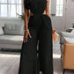 Halter strap backless straight leg jumpsuit in black