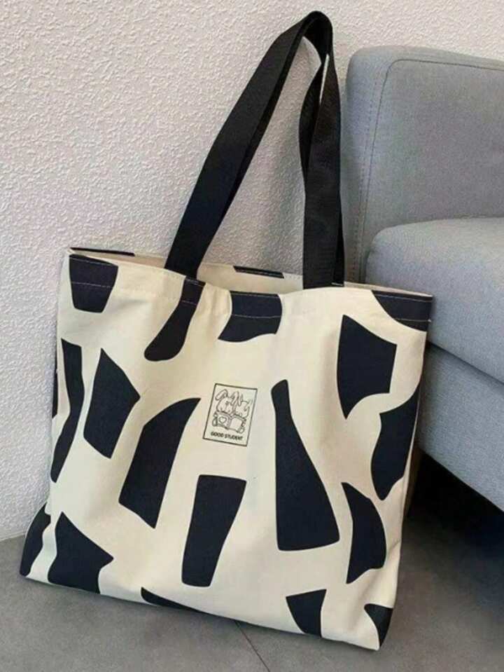 Letter graphic geometric pattern tote bag in black