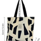 Letter graphic geometric pattern tote bag in black