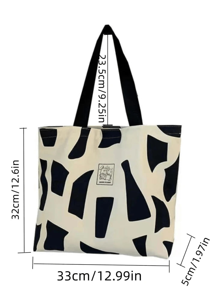 Letter graphic geometric pattern tote bag in black