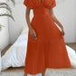 Pleat waist cinched deep v-neck dress in orange