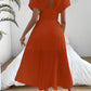 Pleat waist cinched deep v-neck dress in orange