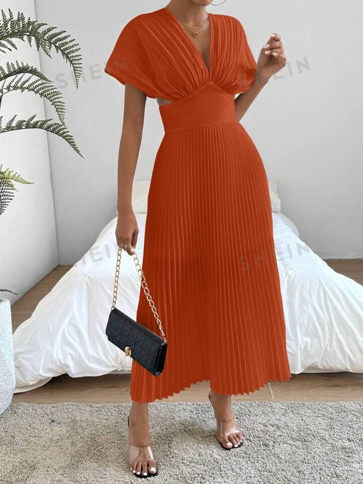 Pleat waist cinched deep v-neck dress in orange