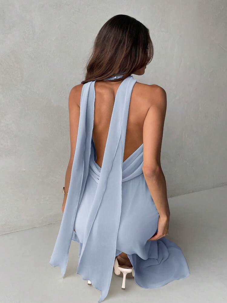 Plunging neck a-line flowy tie back dress in blue
