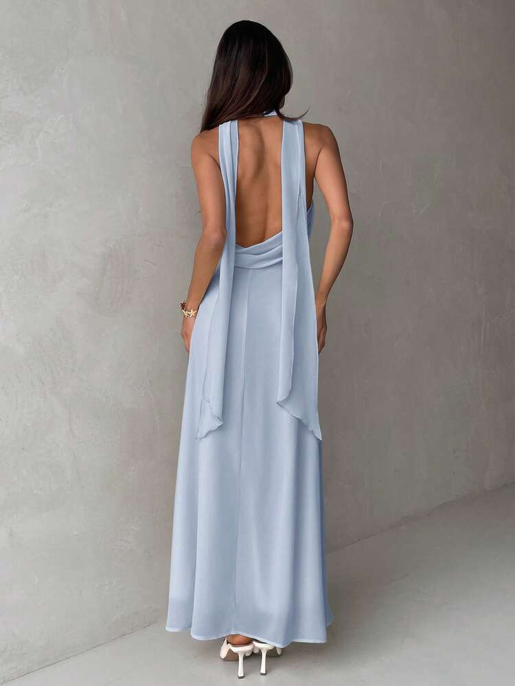Plunging neck a-line flowy tie back dress in blue