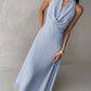 Plunging neck a-line flowy tie back dress in blue