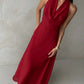 Plunging neck a-line flowy tie back dress in red