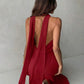 Plunging neck a-line flowy tie back dress in red