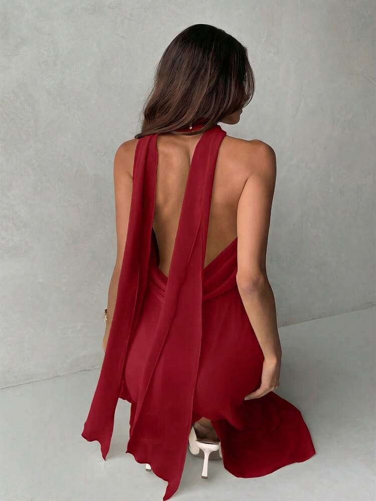 Plunging neck a-line flowy tie back dress in red