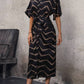 Printed belted shirt dress in black