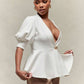 Puff sleeve peplum hem gold button top in white