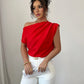 Ruched asymmetric neck blouse in red
