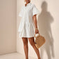 Ruffle hem smock dress in white