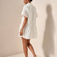 Ruffle hem smock dress in white