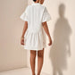 Ruffle hem smock dress in white