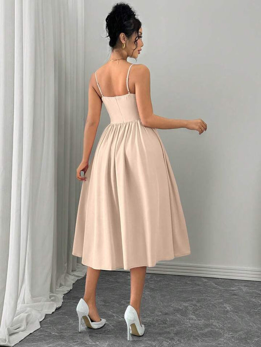 Ruffle hem spaghetti strap waist dress in nude