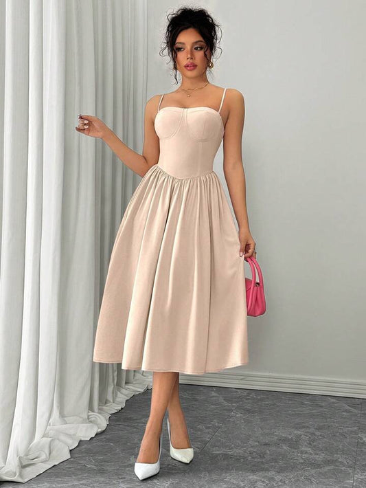 Ruffle hem spaghetti strap waist dress in nude