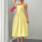Ruffle hem spaghetti strap waist dress in yellow