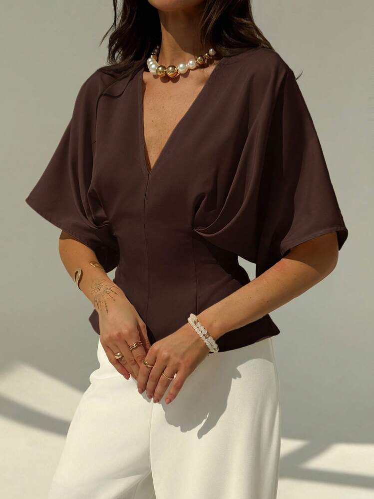 Short sleeve loose fitting blouse in mauve