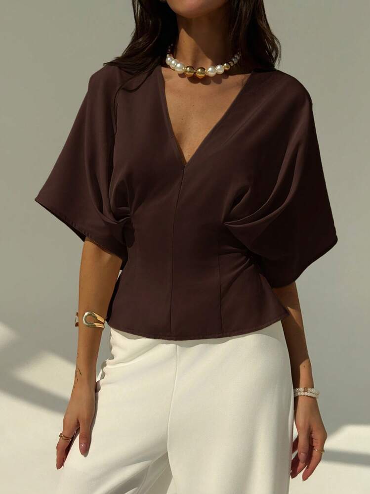 Short sleeve loose fitting blouse in mauve