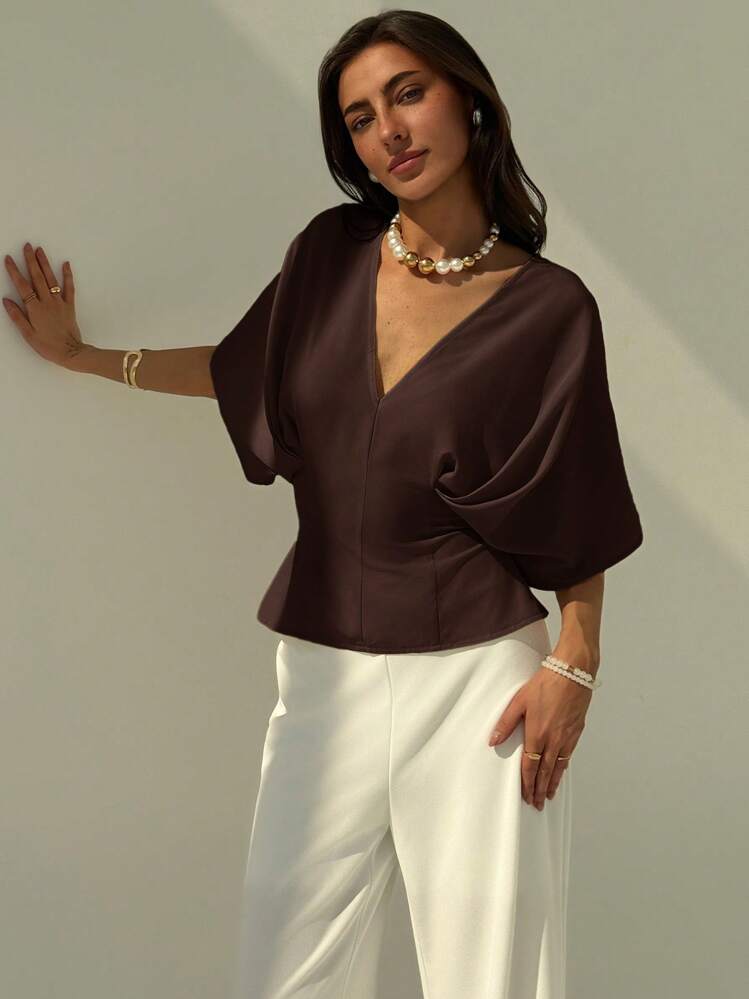 Short sleeve loose fitting blouse in mauve