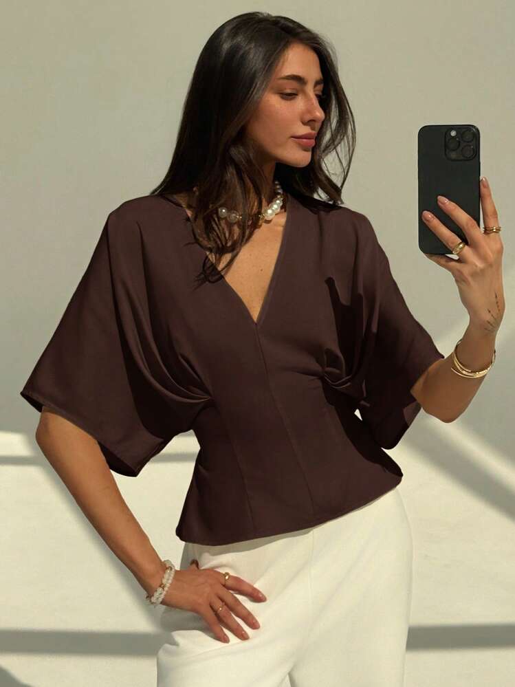 Short sleeve loose fitting blouse in mauve