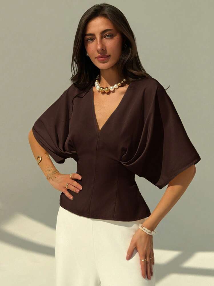 Short sleeve loose fitting blouse in mauve