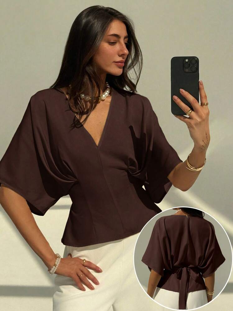 Short sleeve loose fitting blouse in mauve