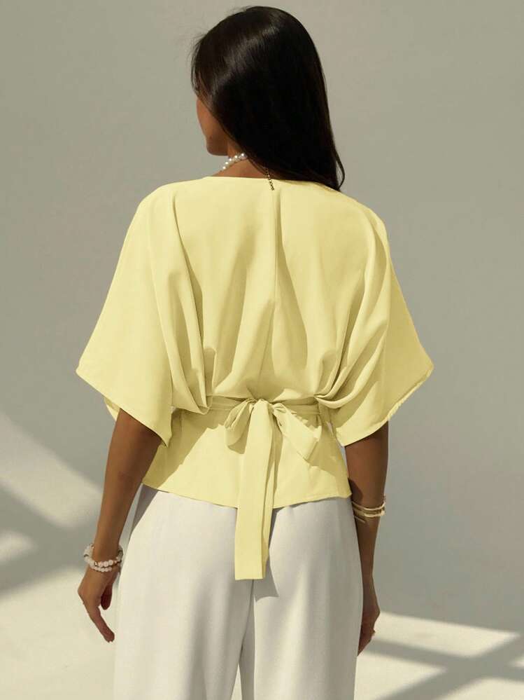 Short sleeve loose fitting blouse in yellow