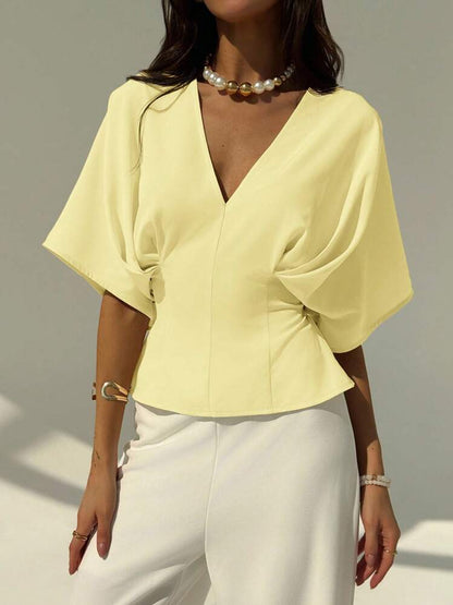 Short sleeve loose fitting blouse in yellow