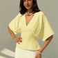 Short sleeve loose fitting blouse in yellow