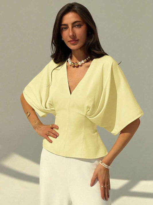Short sleeve loose fitting blouse in yellow