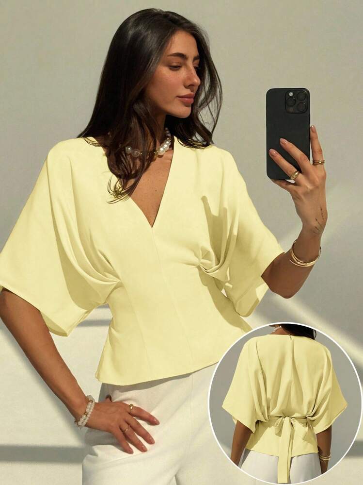 Short sleeve loose fitting blouse in yellow