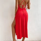 Solid split thigh halter dress in red