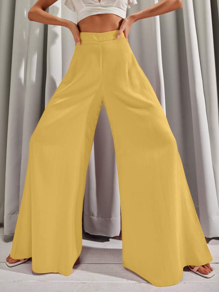 Solid wide leg trousers in yellow