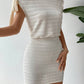 Solid asymmetrical neck knot side bodycon dress in cream