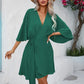 Solid batwing sleeve knot side wrap dress