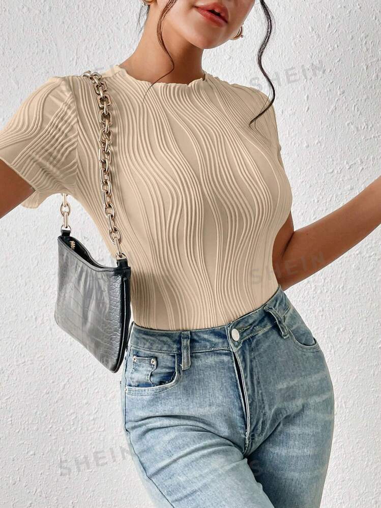 Solid color round neck hollow out short sleeve bodysuit in nude