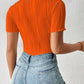 Solid color round neck hollow out short sleeve bodysuit in orange