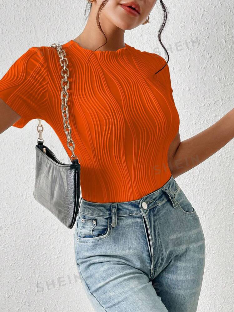 Solid color round neck hollow out short sleeve bodysuit in orange